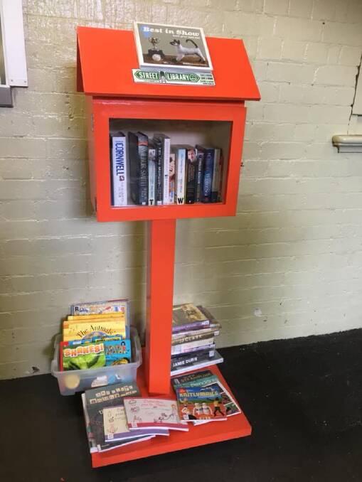 Well read: The portable street library at Banksia railway station is proving to be a hit.