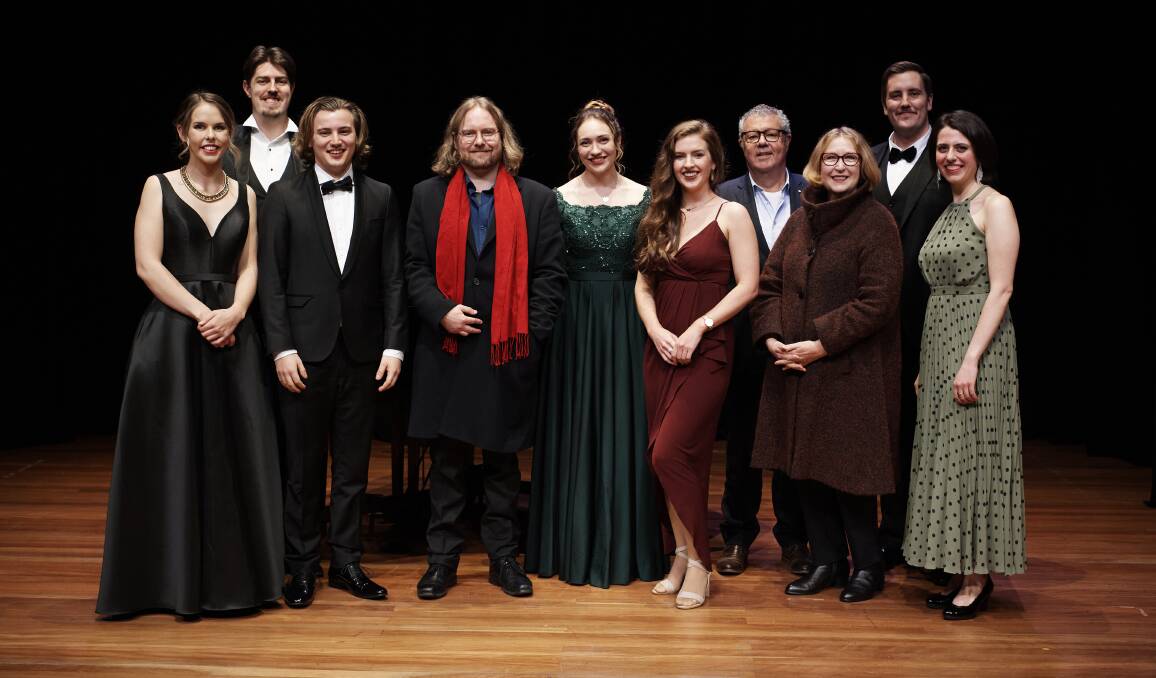 Finalist line-up: Arncliffe's Raphael Hudson, pictured fourth from the left wearing the red scarf, is one of eight opera finalists.
