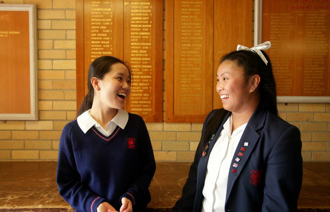 First one down: “We help each other out by sharing resources online – it’s like St George against the state," Year 12 student Yu Chen Ren (left) said. She is pictured with fellow student, Kara Ho. Picture: Chris Lane