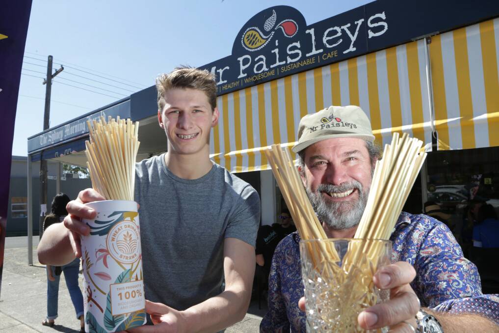 Tall order: High school student Sam Fricker is on a green mission to encourage all cafes in Sutherland Shire to replace single-use plastic straws. Pete Nolan from Mr Paisleys Cafe Caringbah is supporting the teen's initiative. Picture: John Veage