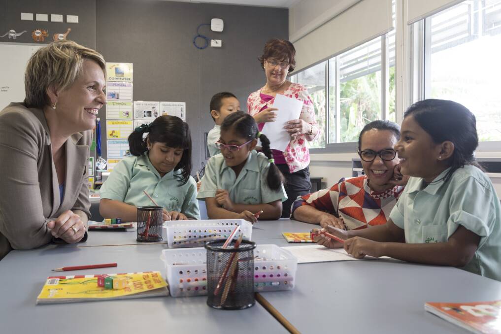 Talking numbers: Shadow education minister Tanya Plibersek and Barton MP Linda Burney welcome pupils back to school. 