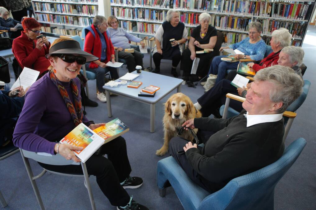 Group inclusion: An inclusive reading session for people with low vision at Caringbah Library. Picture: John Veage