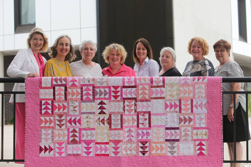 Team patchwork: Holly McMasters from the McGrath Foundation, oncologist Jodi Lynch, Louisa Wessels and breast care nurse Kim Wright with Amy Bloomfield, director of nursing Jan Heiler, Sharon Maloney and Angela McGrath from The Crafty Hive Loftus. Picture: John Veage