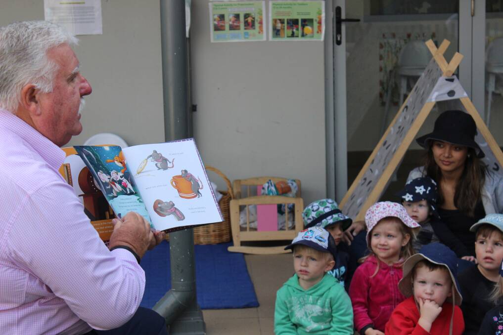 Big Fat Smile chairman David Campbell reads a story to children at Woronora Heights Community Preschool as part of a national reading event.