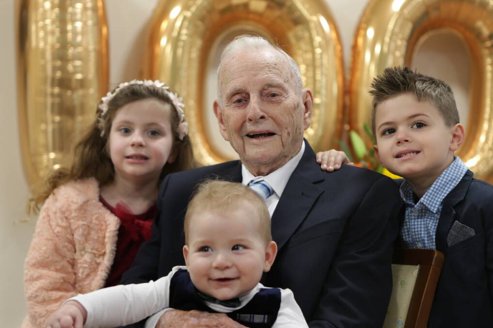Family joy: Henry 'Harry' Mardon with his great grandchildren Tahlia and Lachlan, 5, and Aydin, seven months. Picture: John Veage