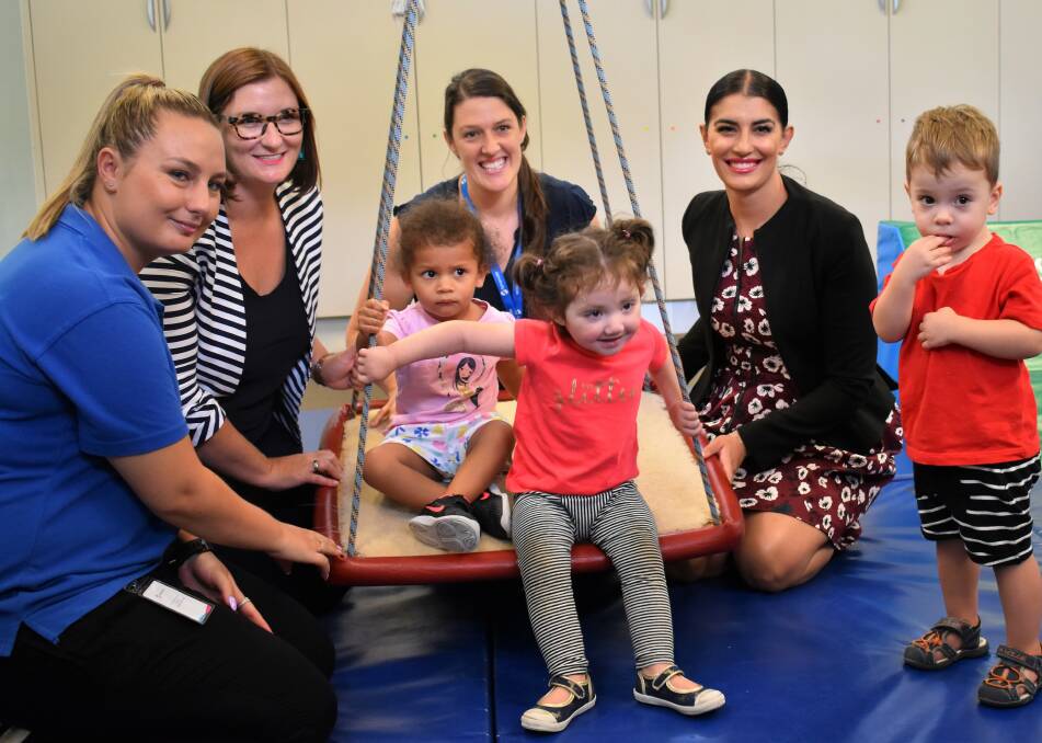 Widening learning opportunities: Miranda MP Eleni Petinos with educators and children from Sylvanvale's Mikarie Childcare Centre, which benefits from funding to expand its services.
