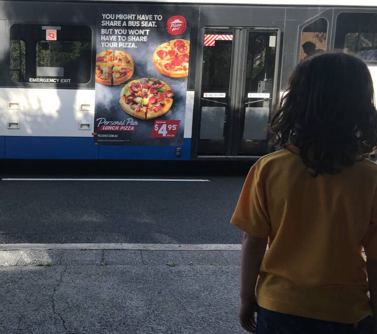 Fast food exposure: A 2019 campaign is calling on the NSW government to curb junk food promotion.