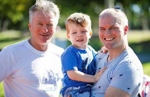 Putting rare diseases on the map: Steve Waugh and Andrew Brodala with Mr Brodala's son Lachlan, who has a rare disease. His father will cycle in a charity ride to support him and other children. 