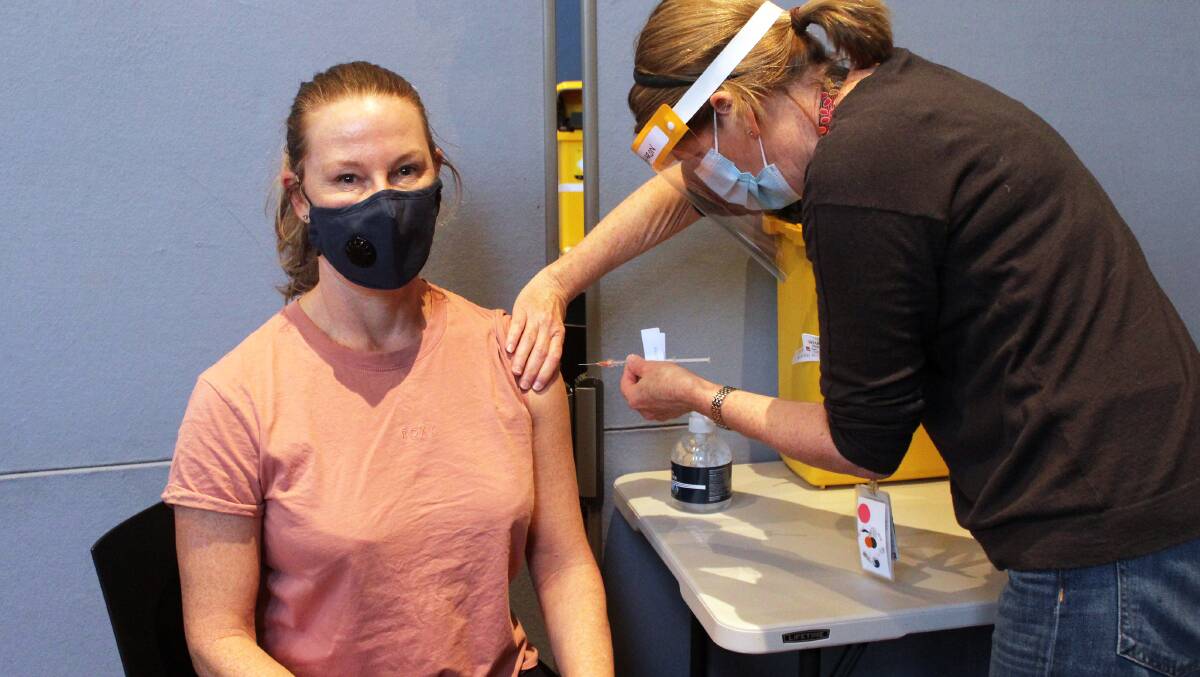 Vaccination milestone: Bobbi Mayne receives her jab from Sharon Greentree at the Rockdale vaccination clinic recently. Picture: Supplied
