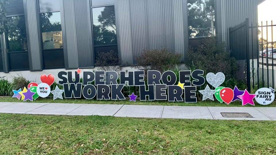 Super feat: This sign popped up outside Caringbah ambulance superstation earlier this week. Picture: Adopt a Healthcare Worker Sutherland Hospital/Facebook 