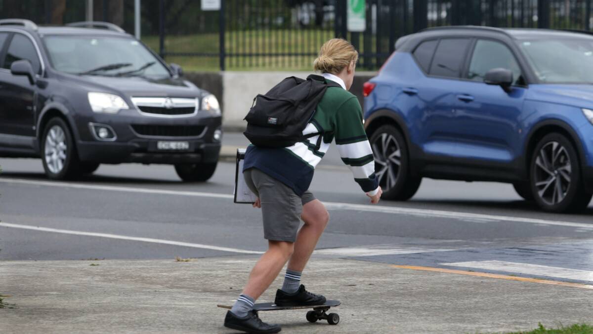 Students roll in: School is back in NSW but some people are refusing to send their children. Picture: John Veage
