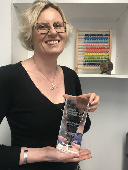 Numbers game: Sonia Gibson with her award. Picture: Supplied