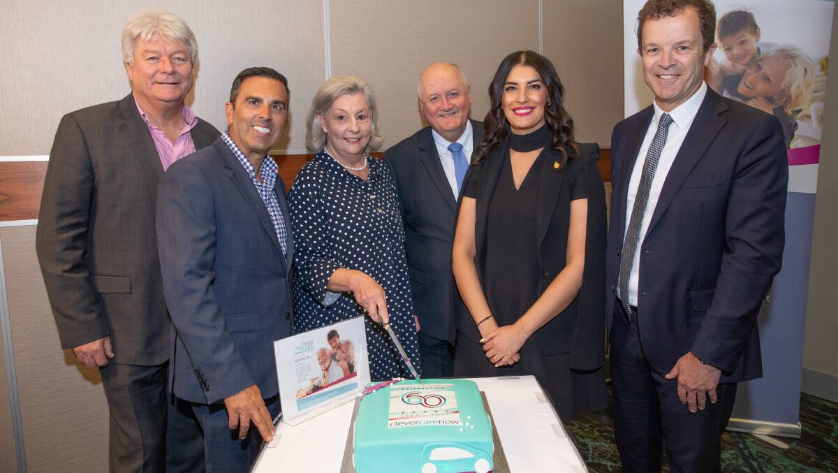 Happy birthday: (L to R) Clever Care NOW's Garry Sheffield with Sutherland Shire Mayor Carmelo Pesce, Clever Care NOW chief executive Jill Deering and state MPs Lee Evans (Heathcote), Eleni Petinos and Mark Speakman (Cronulla) attended the 60th anniversary event.
