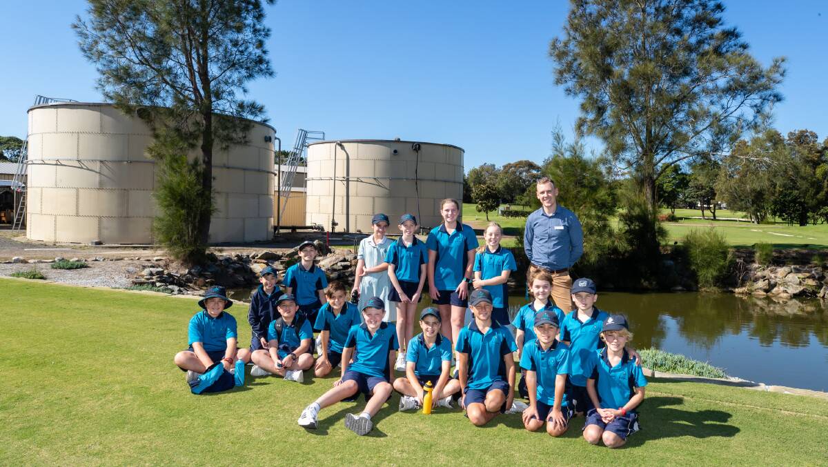 Bright future: Students from St Aloysius Primary School, Cronulla, have been recognised for their outstanding work in developing a water recycling system. Pictures: Supplied