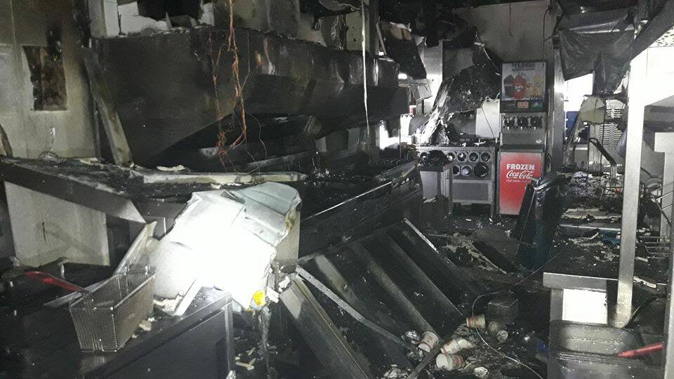 Charred remains: The aftermath of the fire at Hungry Jacks Heathcote. Pictures: Fire and Rescue NSW