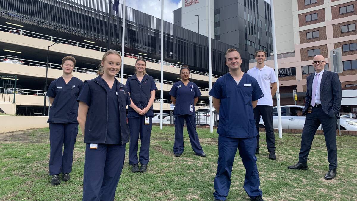 Frontline workers: St George Hospital general manager Paul Darcy (right) with nurses Angela Priftis, Ciara Doyle, Georgia Wilson, Jomarie Bartido, Bailey Keating and Adam Buffin. Picture: Supplied 