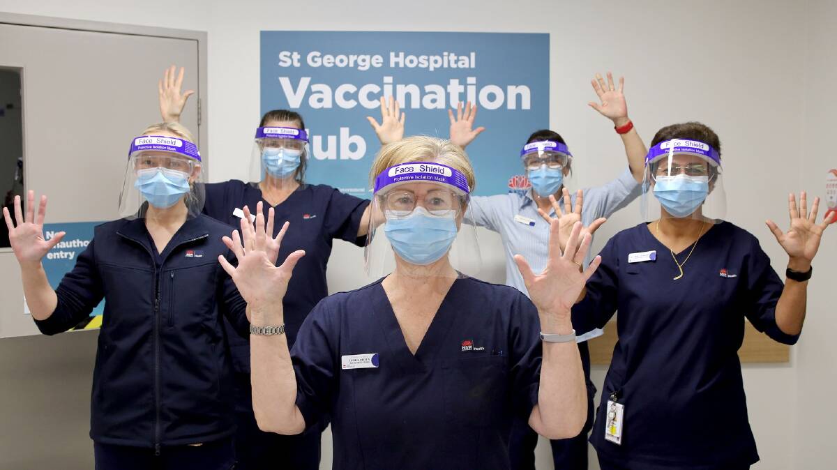 50,000 club: Staff from St George Hospital COVID-19 Vaccination Hub celebrate a major milestone. Picture: Facebook/South Eastern Sydney Local Health District 