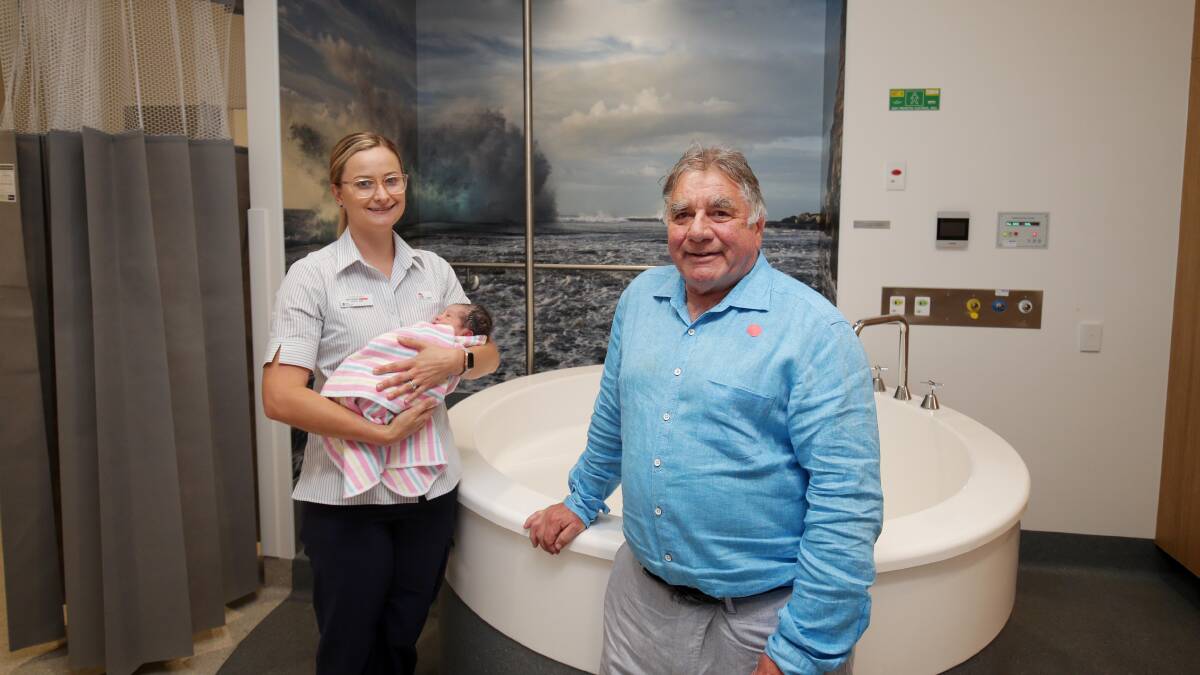 State-of-the-art: Professor Michael Chapman and acting midwifery unit manager Monique Keevers with a newborn baby in one of the birthing suites last week. Picture: Chris Lane 