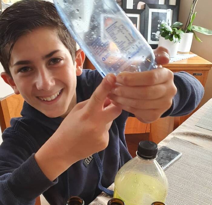 Cans for a cause: Vaughn Arambatzis has been collecting cans and bottles to recycle and raise money for a cause close to his heart. Pictures: Supplied