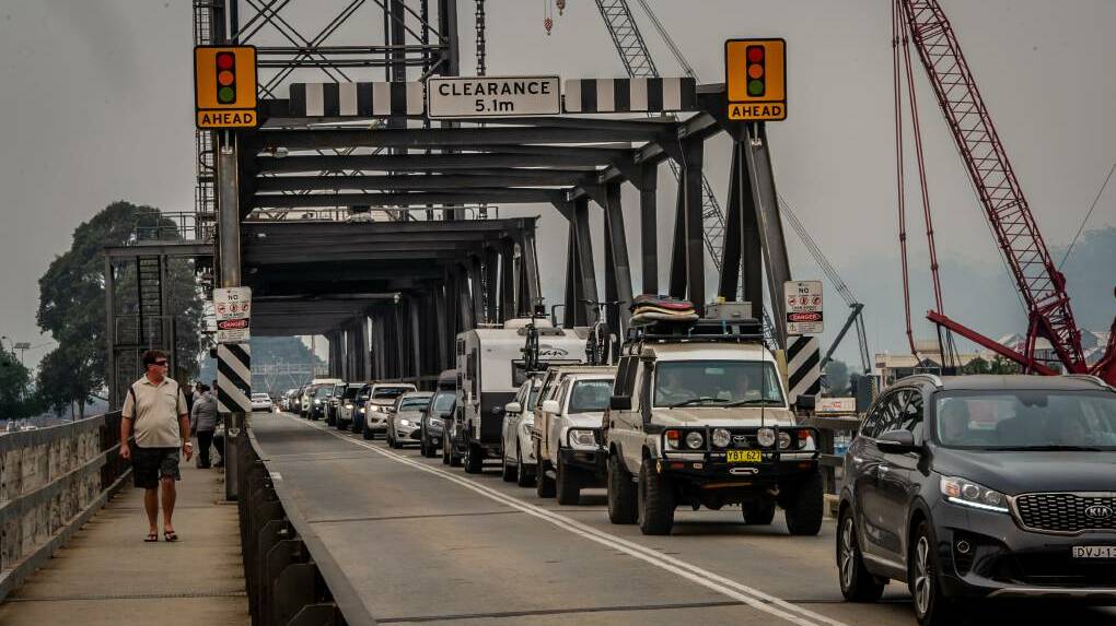Trying to flee: Traffic on Batemans Bay bridge at a standstill yesterday. Picture: Karleen Minney