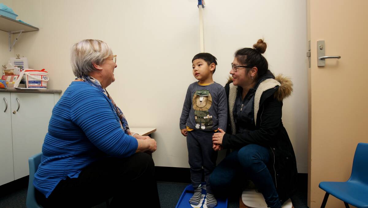 In doubt: Child & Family Health Clinics provide an invaluable service for families. Pictured here is nurse Wendy Butler performing a free four-year-old check-up. Picture: Chris Lane 