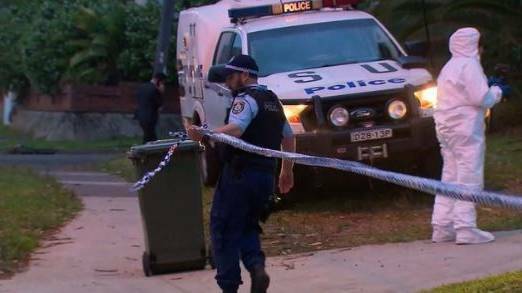 Crime scene: Police outside the home on Wednesday. Picture: 9 News
