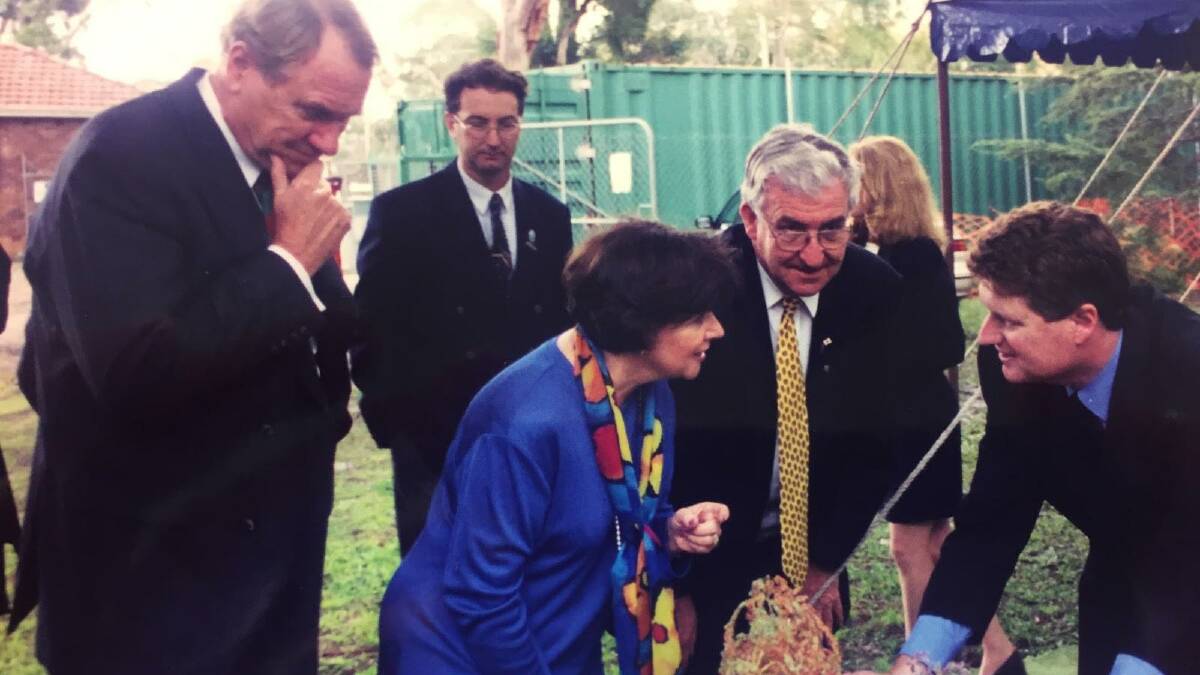 Open for business: Former Federal MPs Bruce Baird (Cook), far left and Danna Vale (Hughes) front at the official opening. 