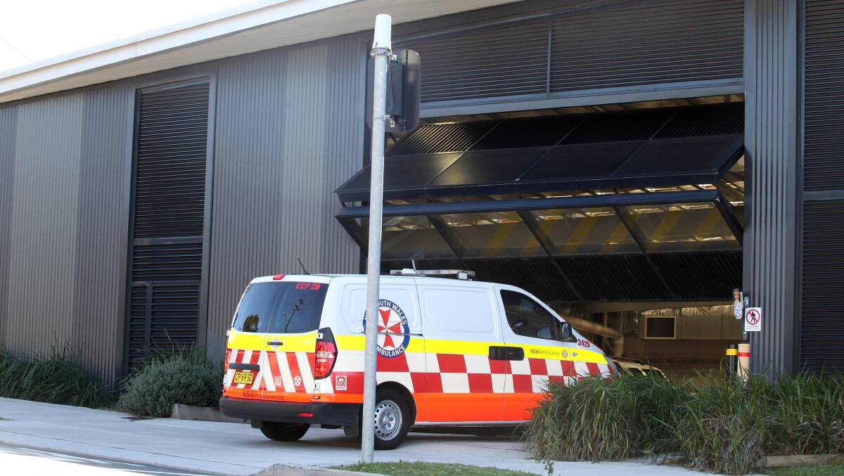 Treatment time: An ambulance arrives at Kogarah station. Picture: Chris Lane