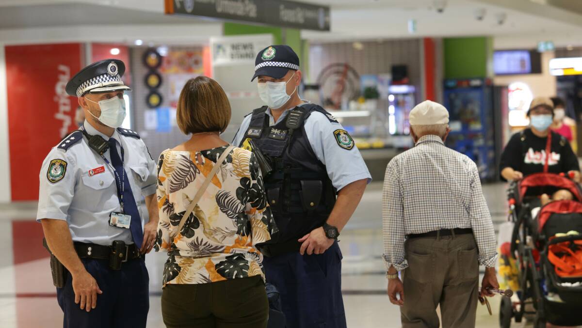 St George Police Area Command officers including duty officer, Inspector Ben Kennis, carry out face mask compliance at Westfield Hurstville today. Pictures: John Veage 