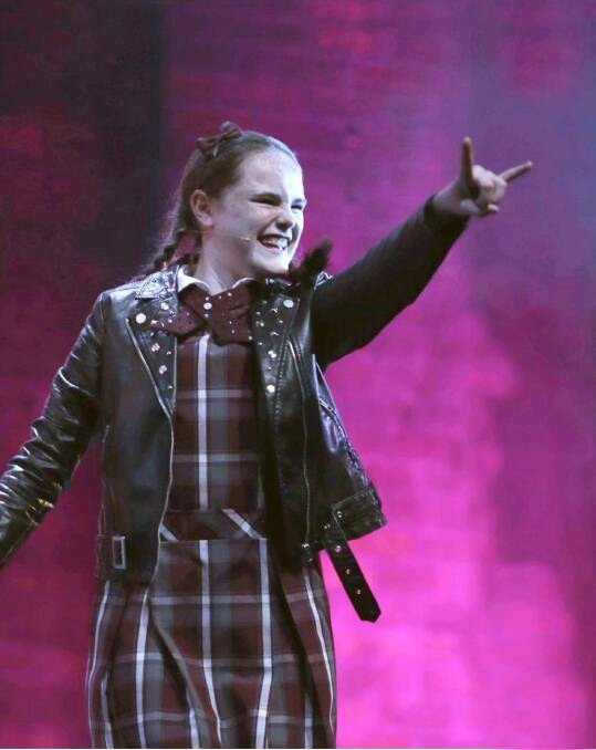 Dream role: Asha Rostron on stage as Sophie in School of Rock. Picture: Supplied