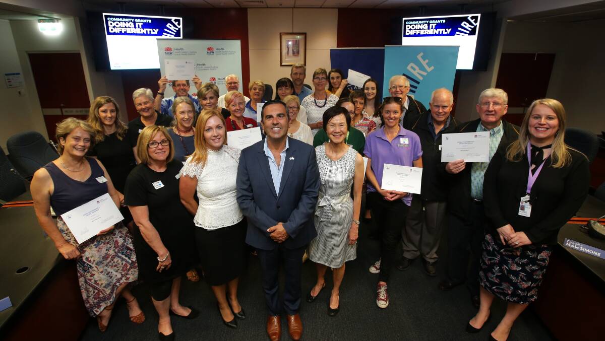 Doing it Differently: Sutherland Shire Mayor Carmelo Pesce with the grant recipients.
Picture: John Veage