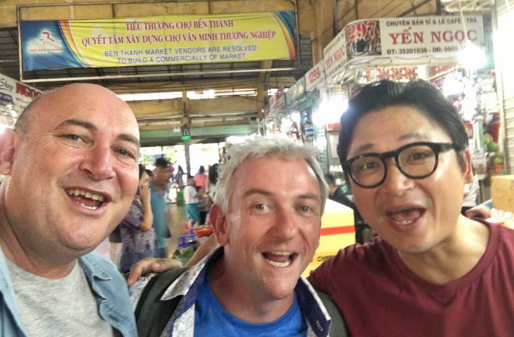 Travel guides' guide: Matt and Brett with their market food guide Luke Nguyen.