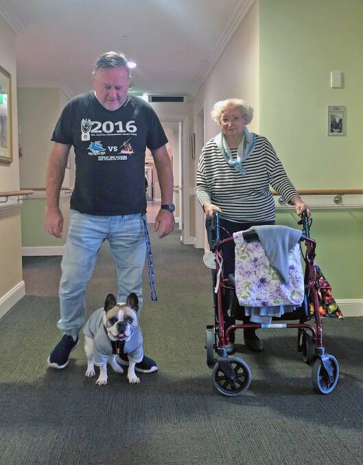 Happiness: Residents at Moran Aged Care love it when pets pop in for a visit. Photos: Supplied