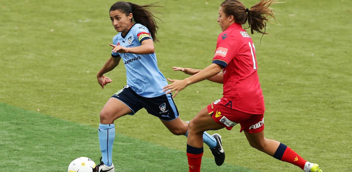 Home sweet home: Teresa Polias (left) playing for Sydney FC against Adelaide United at Seymour Shaw Park, Miranda in November. Picture: Matt King/Getty Images