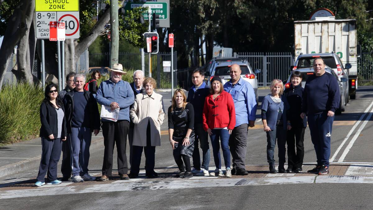 We will not be moved: Residents are opposed to the proposed removal of the pedestrian crossing in Tooronga Terrace, Beverly Hills, presenting a 600-signature top Georges River Council. Picture: John Veage