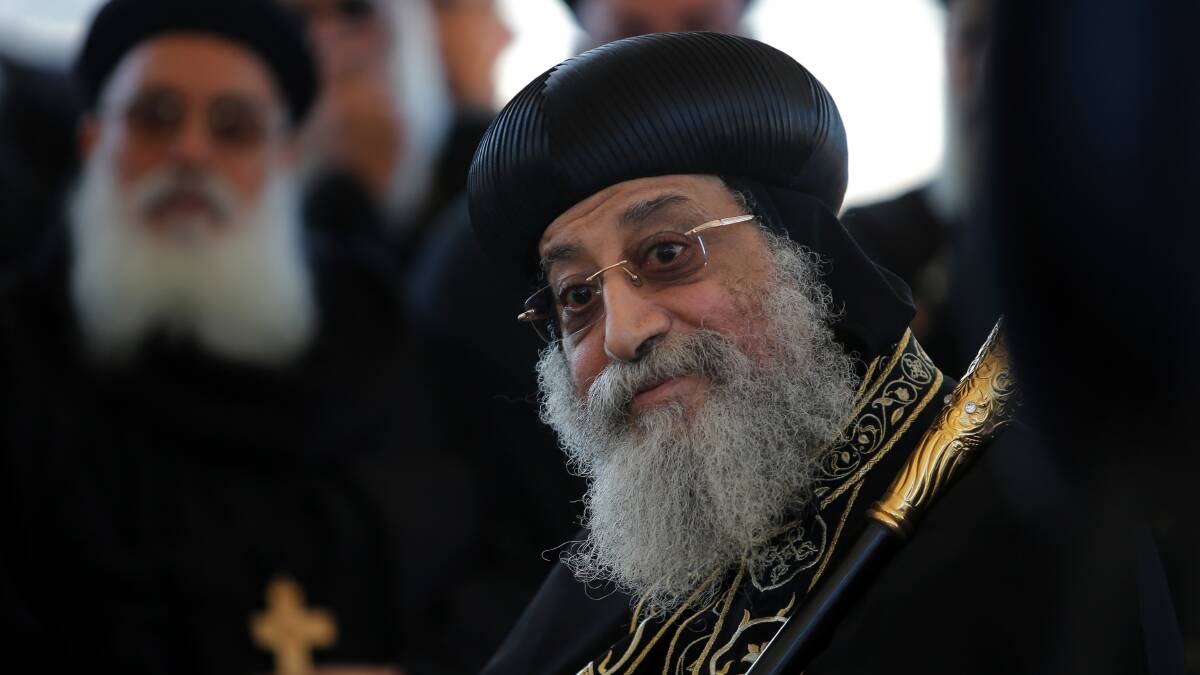 Pope Tawadros II meets dozens of local families during a visit to Caringbah. Pictures: John Veage