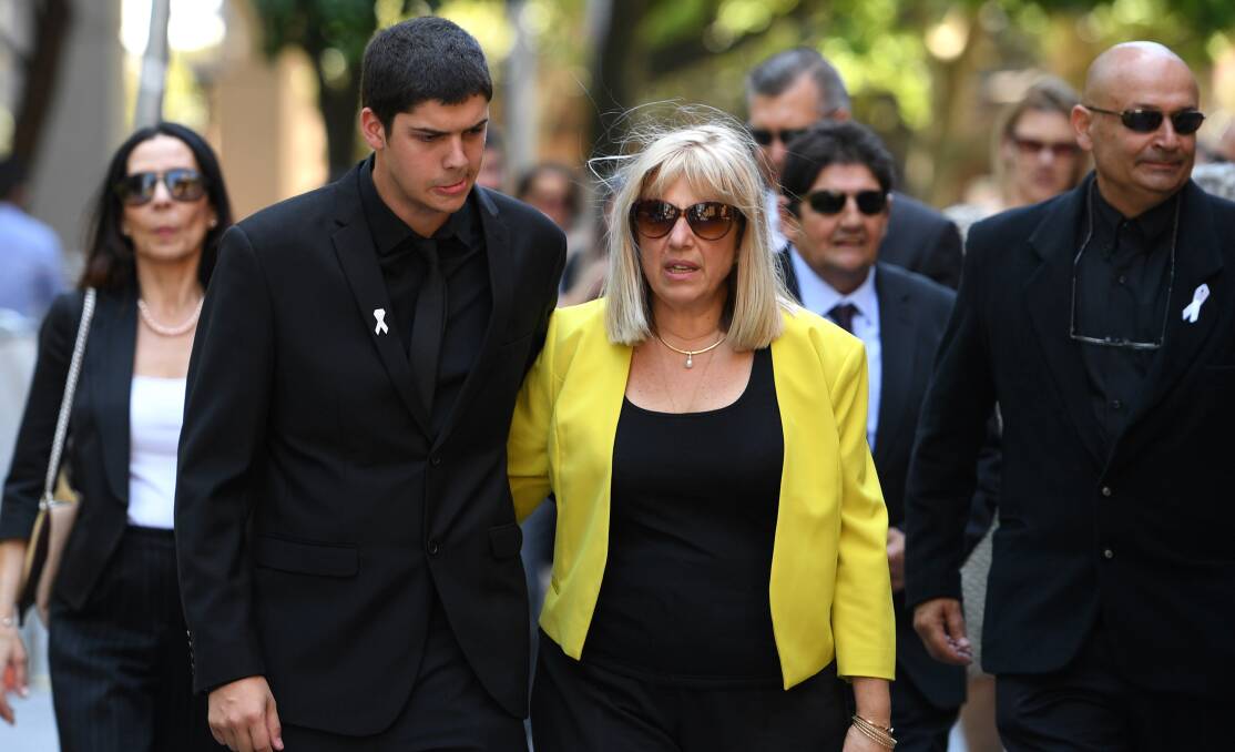 United: Daniel Boyd, the son of Tina Kontozis, arrives with his family at the NSW Supreme Court on Friday. Picture: AAP/Dan Himbrechts