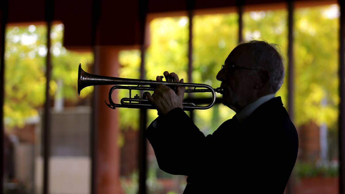 John Harris, 83, first played the Last Post as a teenager in 1948. Pictures: John Veage