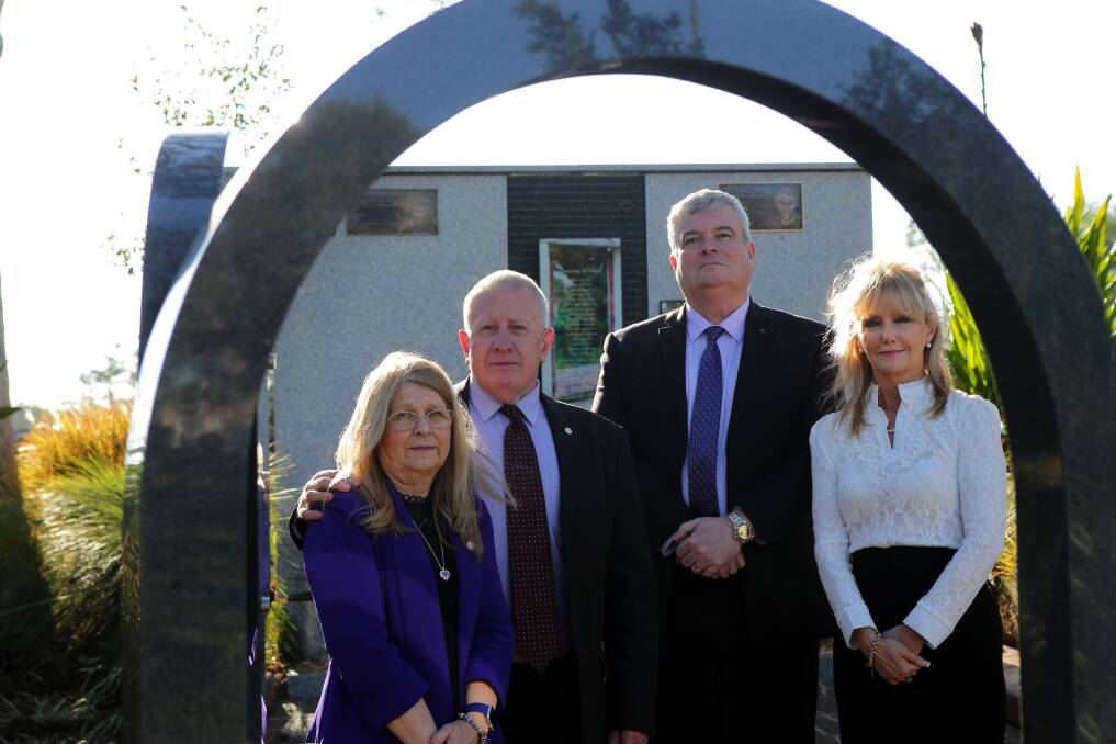 Remembrance: From left, Faye and Mark Leveson who will attend the ceremony for Missing Persons Week at Woronora Memorial Park this Friday, pictured at the Doorway of Hope Memorial with Southern Metropolitan Cemeteries NSW's Graham Boyd and Carolyn Dowe. Picture: John Veage