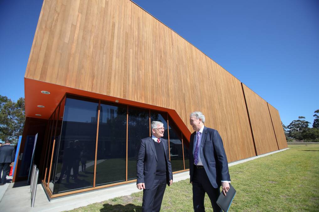 COLLABORATION: ANSTO chief executive officer Dr Adi Paterson and UOW Vice-Chancellor Professor Paul Wellings.