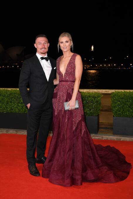 Clash: Helensburgh's Damien Cook has been forced to delay his wedding after his selection in the Kangaroos team. Picture: AAP Image/Dan Himbrechts.