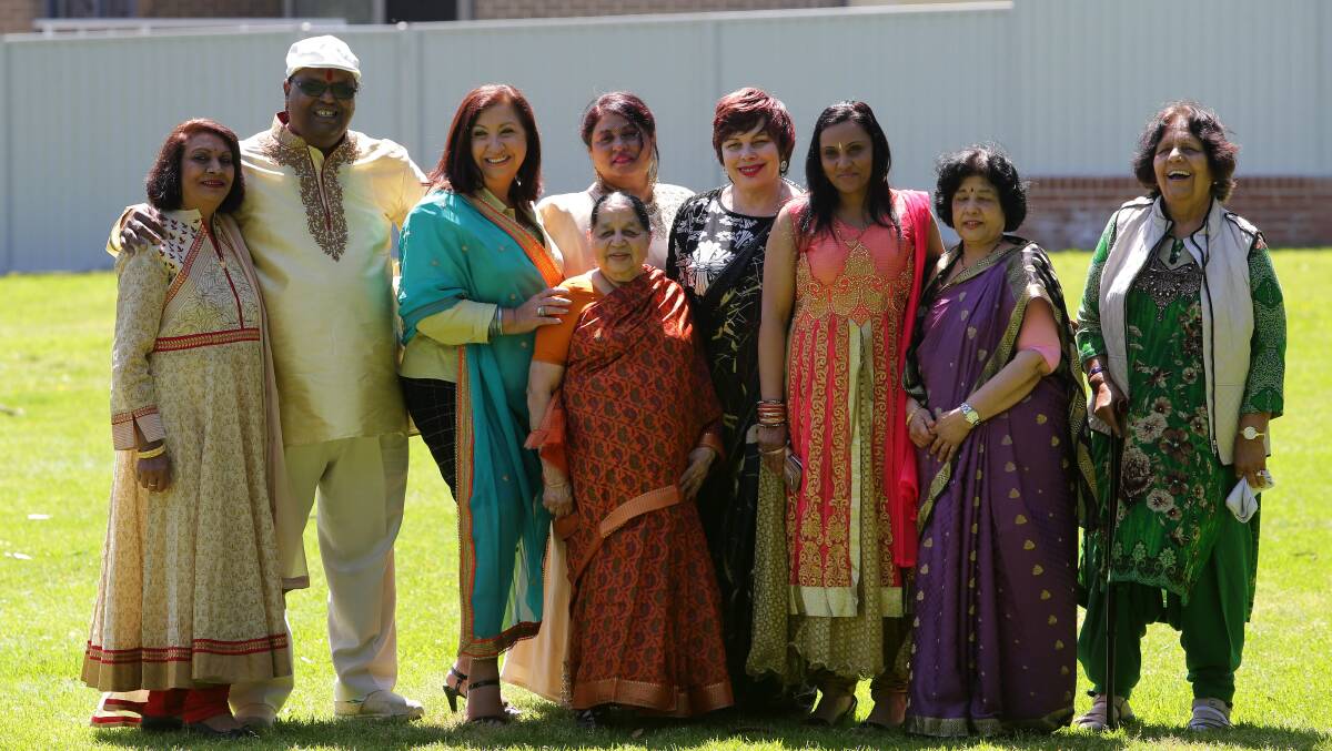 Kingsgrove Community Aid Centre CEO, Anne Farah-Hill, third from left, with members of the Indian community celebrating the Diwali Festival last week. Picture: John Veage