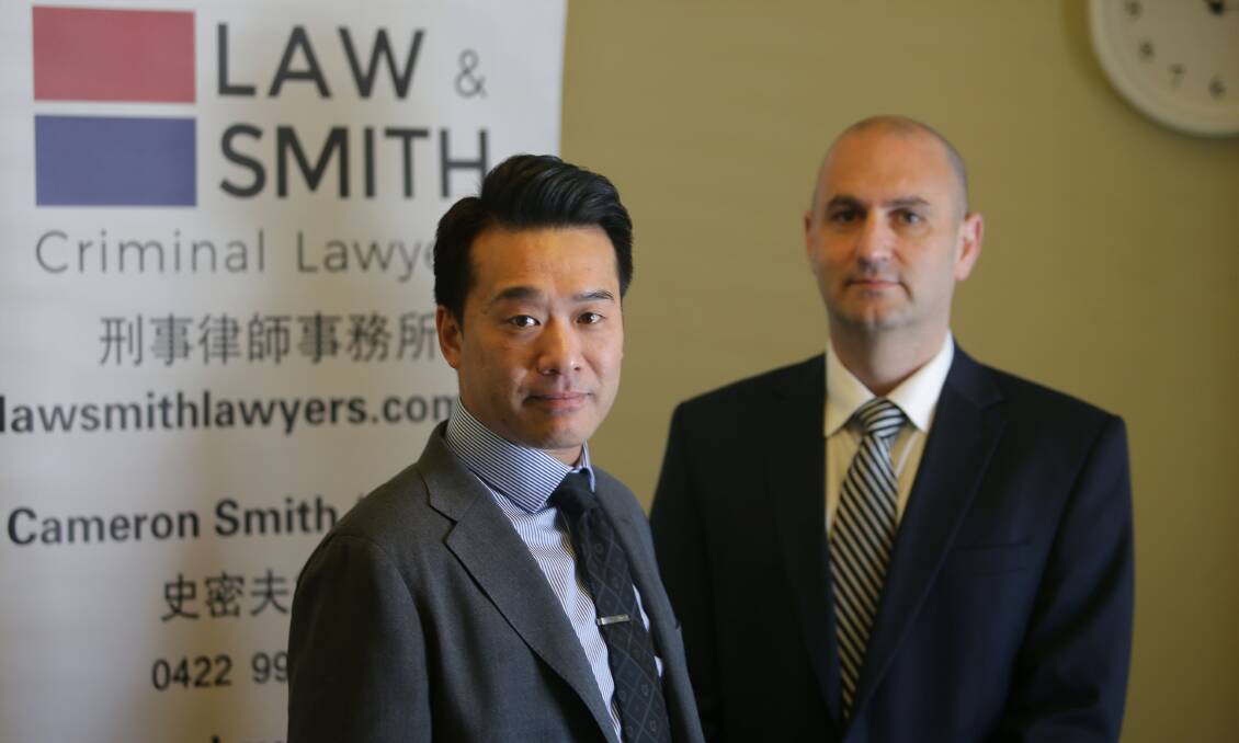 Levelling the field: Former police prosecutors Wayne Law (left) and Cameron Smith have opened their own law firm, Law and Smith Criminal Lawyers and are now defending those they previously prosecuted. Picture: John Veage