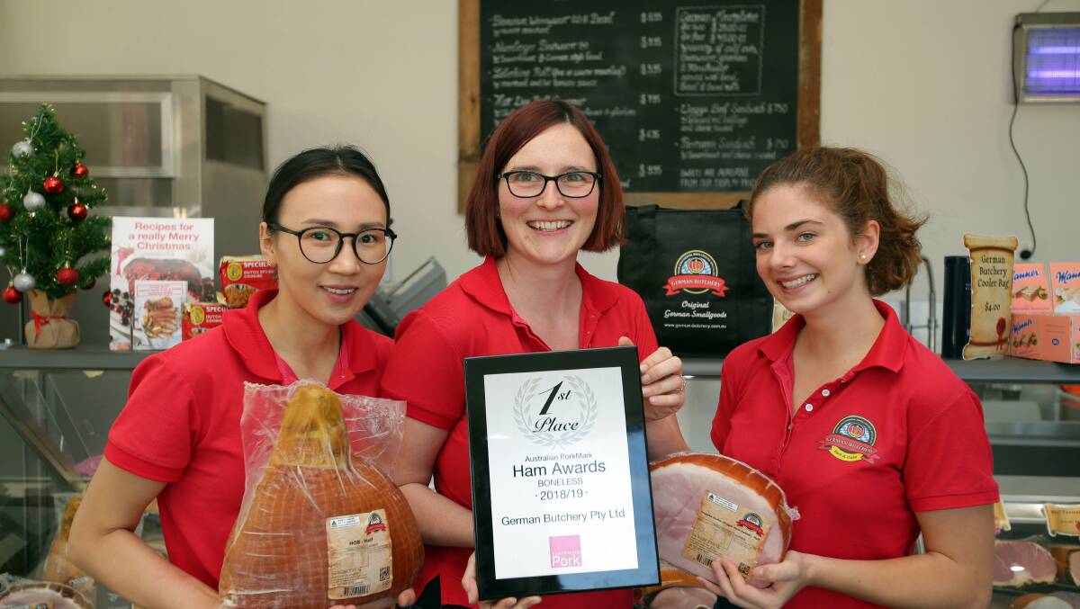 Hambitious leg up in national pork awards:The German Butchery Deli and Cafe at Bexley North has won Australia's Best Boneless Ham award in the annual Australian PorkMark Awards. Madeleine Herz (centre) with staff members Christey and Sabrina. Picture: Chris Lane