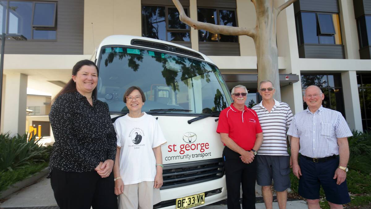 All aboard: St George Community Transport is trialling a shuttle bus service for its clients running between Hurstville and Kogarah. Pictured from left is St George Community Services ceo Carol Strachan, resident Elizabeth Vong, driver Ian Moy and residents Michael Partlin and John Begg. Picture: Chris Lane