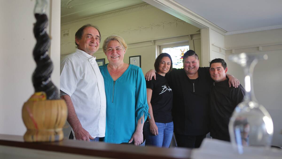 Final orders: from left, Ivan and Jackie Lajdes with their children Suzie, Sandra and David who have all worked in the Penshurst Cottage Italian and Seafood Restaurant. The restaurant is closing on Father's Day after 28 years of trading. Picture: John Veage