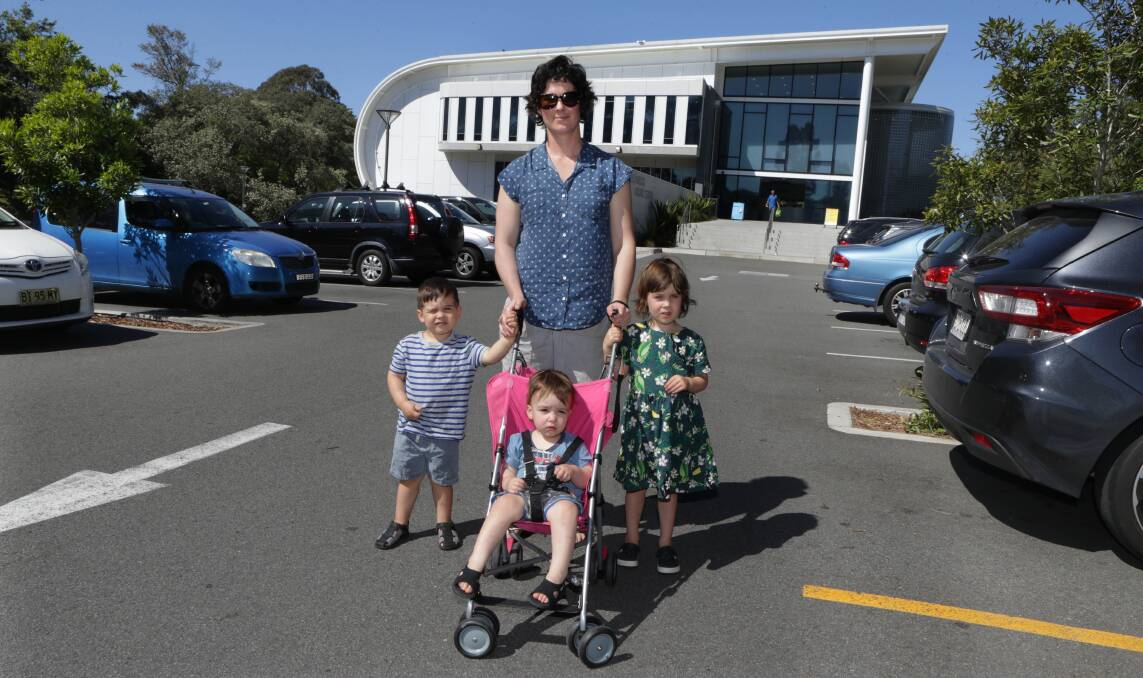 Left high and dry: Bridget Murphy with her children Tamsin, four; Rhys, two; and Kieran, one; outside Bexley pool. Picture: John Veage