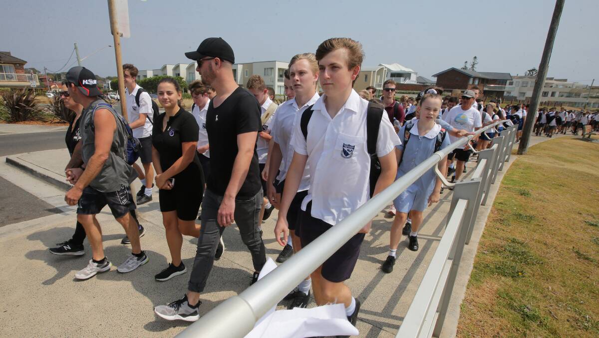 Long walk: Hundreds of people took part in the Sutherland Shire White Ribbon Walk today. Pictures: John Veage