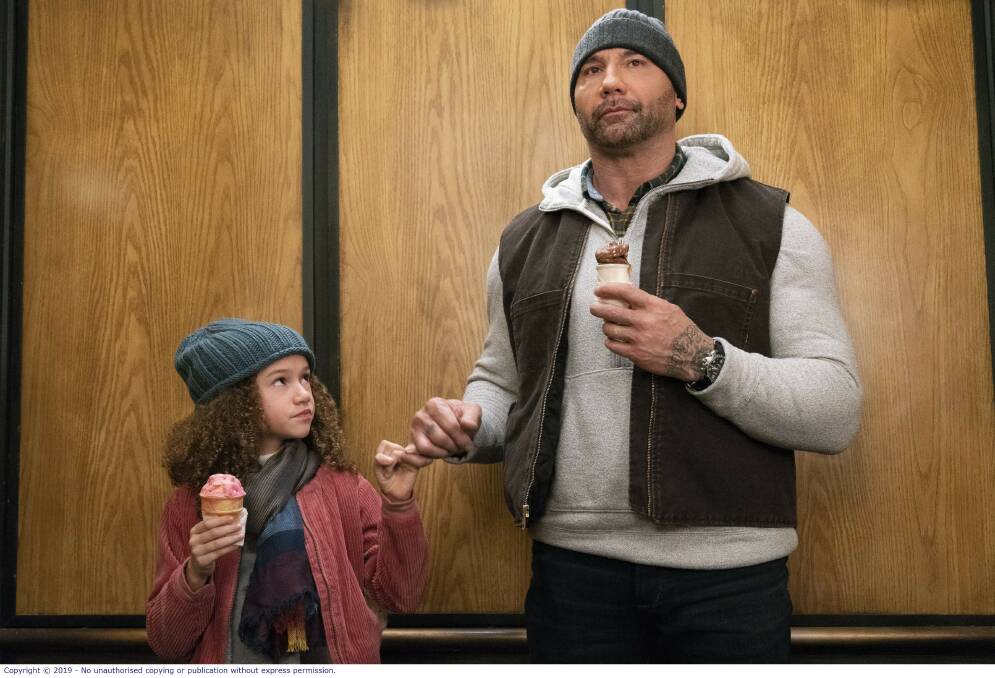 Chloe Coleman, left and Dave Bautista in My Spy. Picture: Roadshow