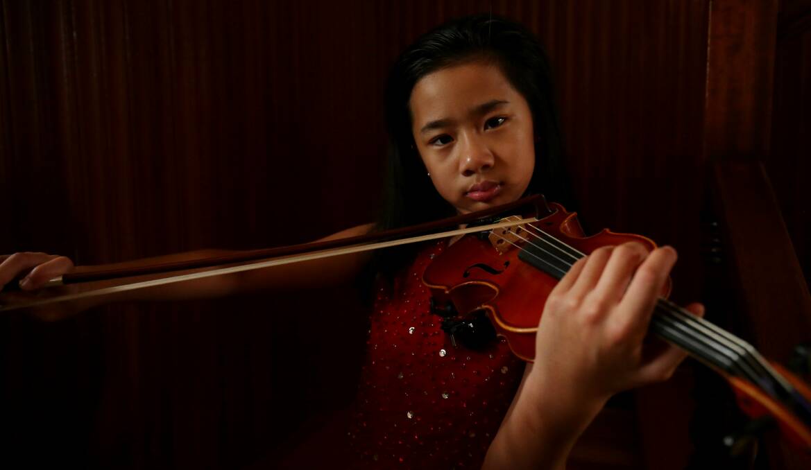 Violinist Emma Rose Koeswandy, 9, is off to New York to play at Carnegie Hall. Picture: Chris Lane